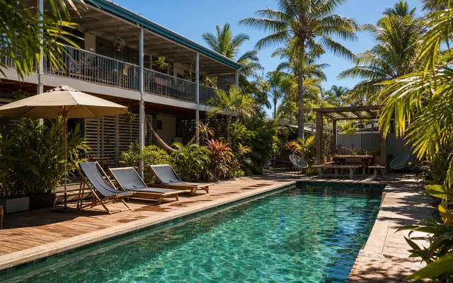 Pool deck at a tropical Cairns backpacker hostel