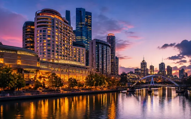 Crown Melbourne's riverside facade along the Yarra at night
